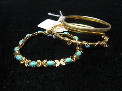 Appraisal: Three yellow gold bracelets Two bangles one with diamonds and