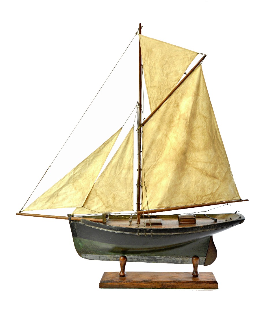 Appraisal: A small Bermudian cutter rigged pond yacht with black and