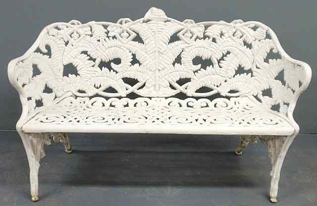 Appraisal: Victorian white painted cast iron bench in a fern design