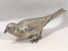 Appraisal: An ornamental standard silver bird