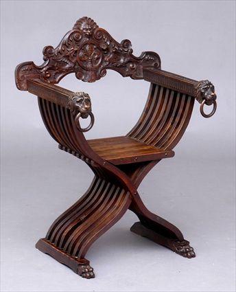 Appraisal: ITALIAN RENAISSANCE-STYLE CARVED WALNUT SAVONAROLA CHAIR The shaped lift-off top