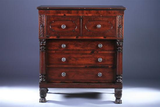 Appraisal: EMPIRE MAHOGANY TWO-OVER-THREE DRAWER CHEST th century With turned carved