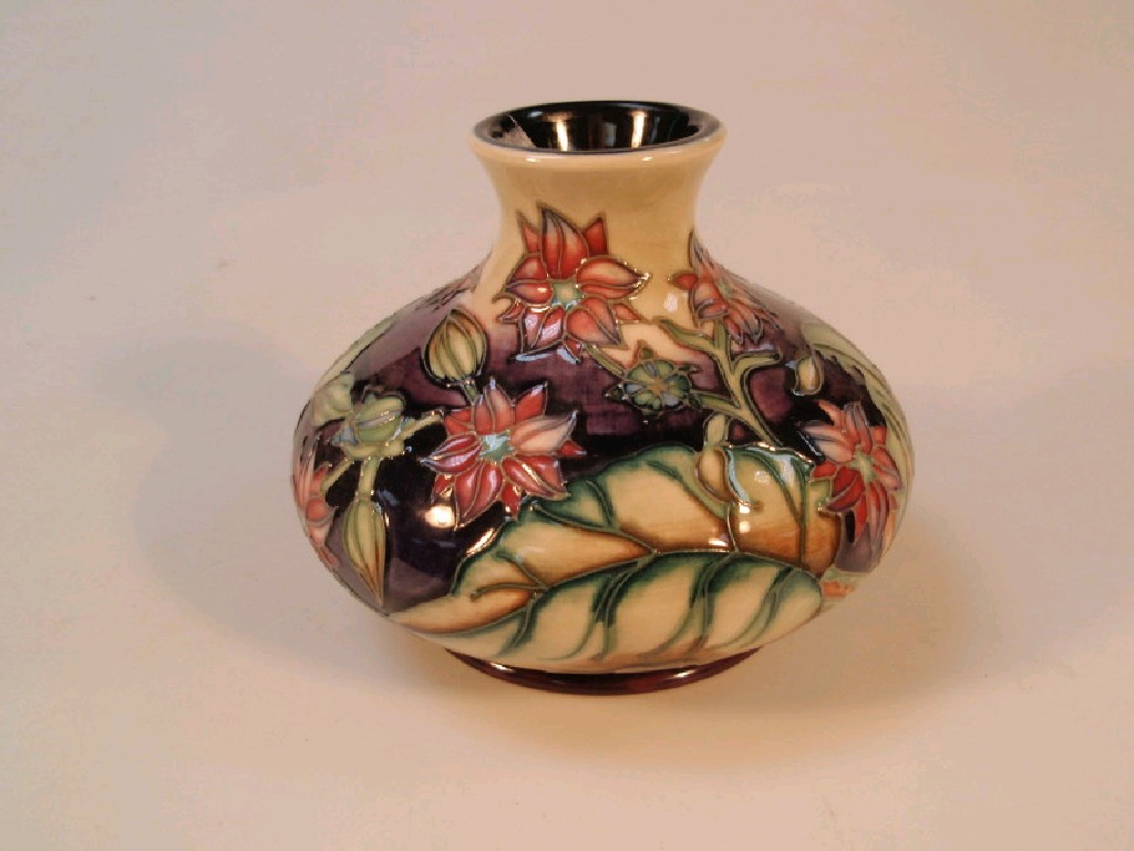 Appraisal: A modern Moorcroft squat globular vase with pink floral decoration