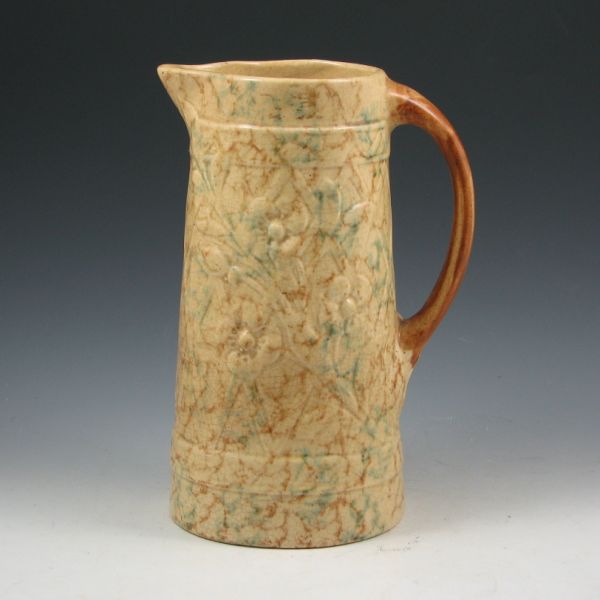 Appraisal: Roseville gold Cornelian utility pitcher with floral and lattice mold