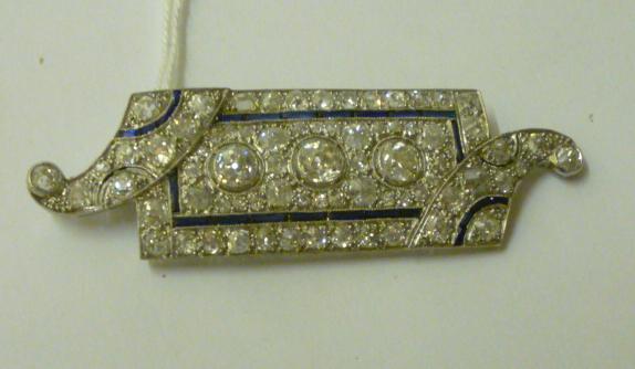 Appraisal: AN ART DECO DIAMOND AND SAPPHIRE BROOCH of shaped oblong