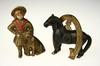 Appraisal: STILL BANKS - Lot of two cast iron Buster Brown