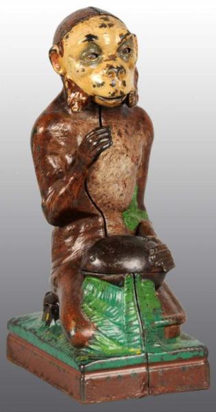 Appraisal: Cast Iron Monkey Coconut Mechanical Bank Description Manufactured by J