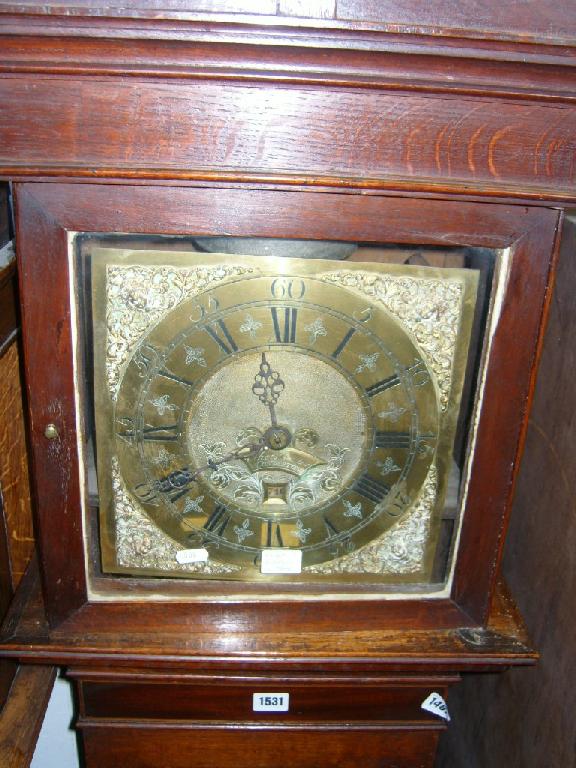 Appraisal: A Georgian oak longcase clock with square cut hood enclosing