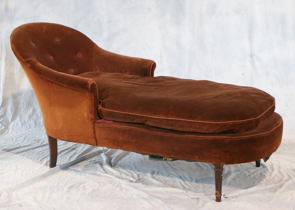 Appraisal: Rust velvet upholstered chaise lounge th C l x w