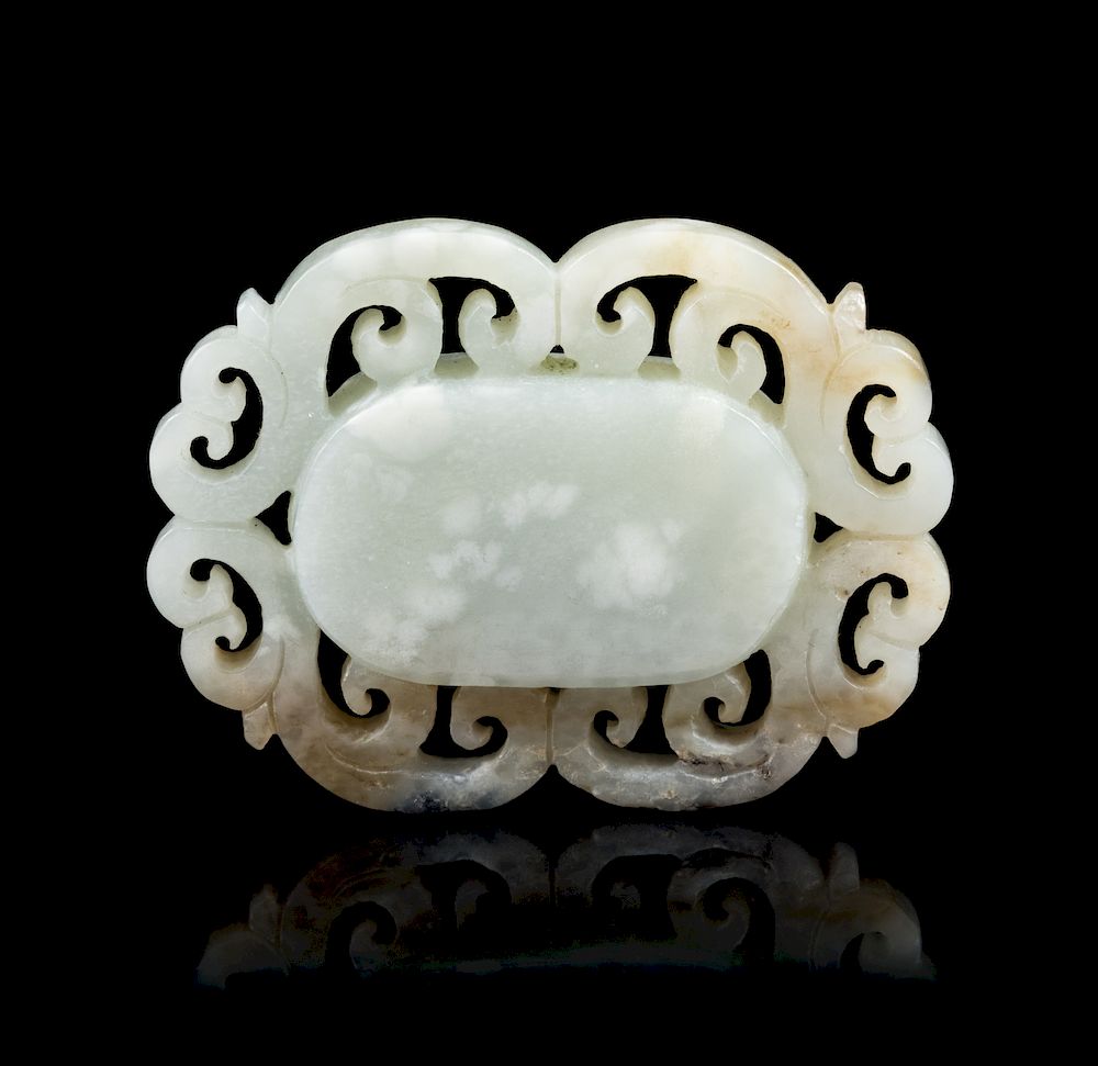 Appraisal: A Chinese Pale Celadon and Russet Jade Pendant Length in