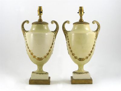 Appraisal: A pair of creamware Neoclassical urns converted as table lamps