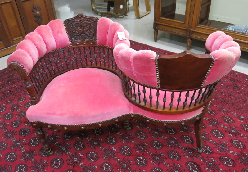 Appraisal: LATE VICTORIAN TETE-A-TETE American c an S-shaped sofa on which