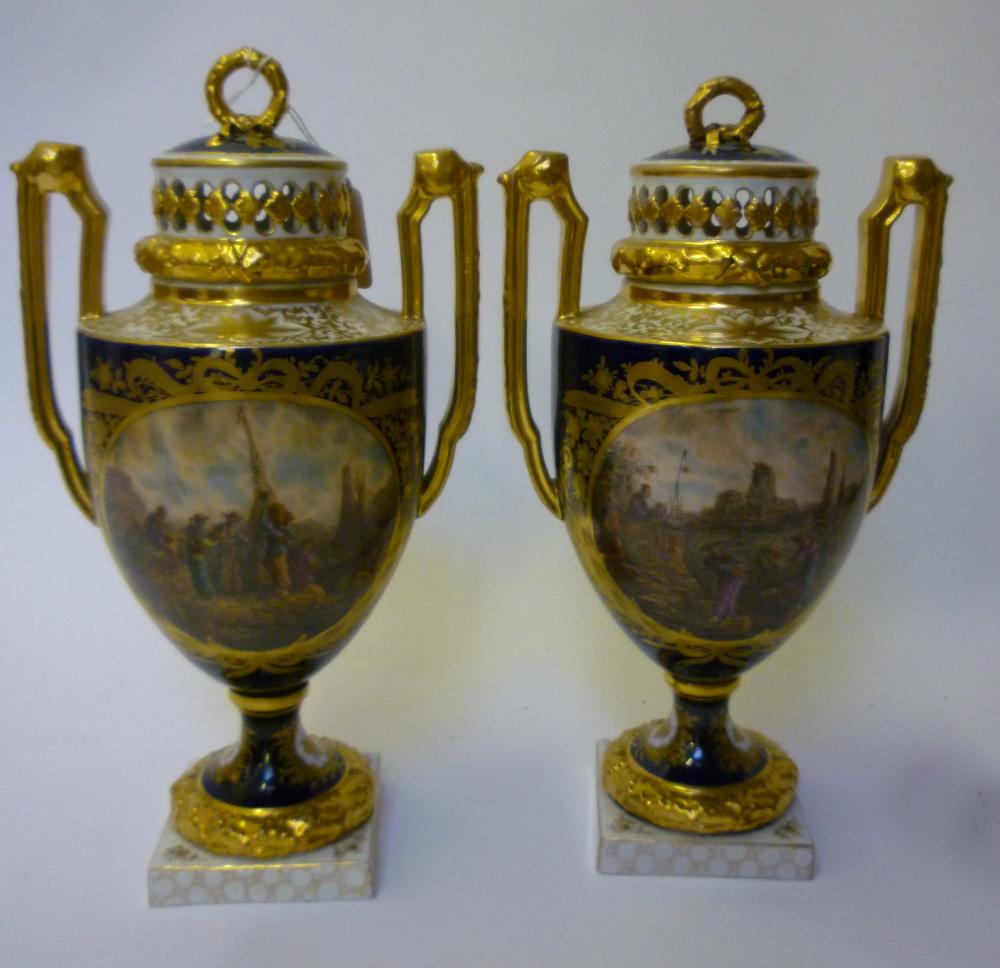 Appraisal: A COMPOSITE PAIR OF VIENNA PORCELAIN POT POURRI VASES AND