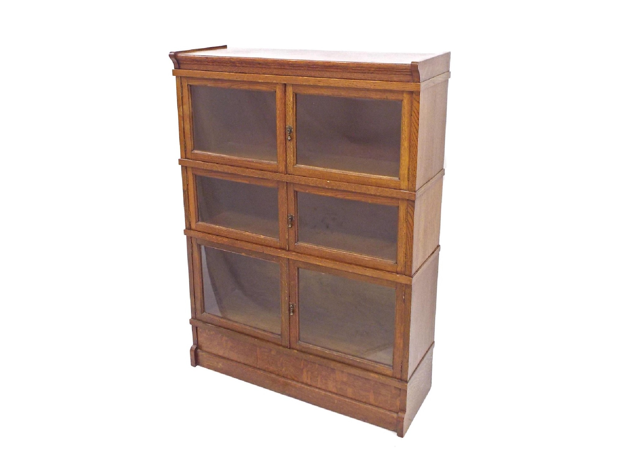 Appraisal: Three tier oak sectional bookcase with twin glazed doors and