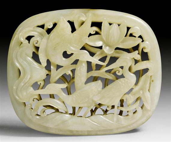 Appraisal: A WHITISH OPENWORK JADE PLAQUE DECORATED WITH CRANES IN A