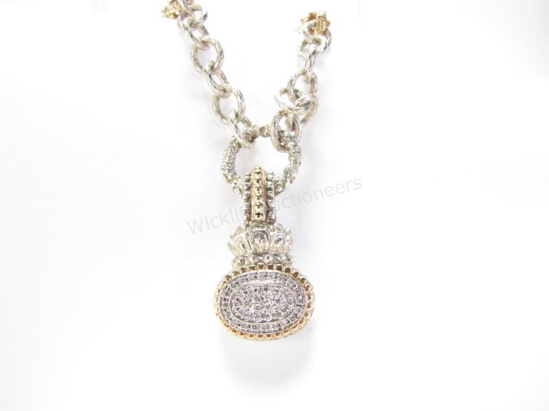 Appraisal: A K yellow gold and sterling silver detachable pendant by