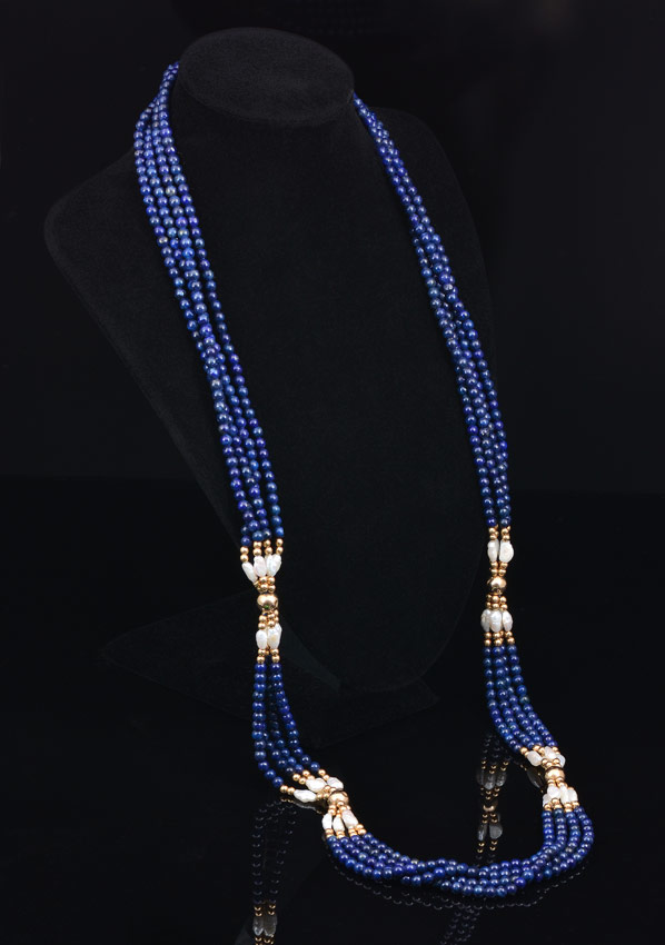 Appraisal: K GOLD LAPIS AND PEARL NECKLACE '' twisted multi strand