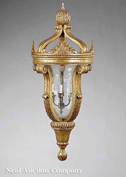 Appraisal: A Pair of Italian Neoclassical-Style Carved Giltwood Hanging Lanterns having