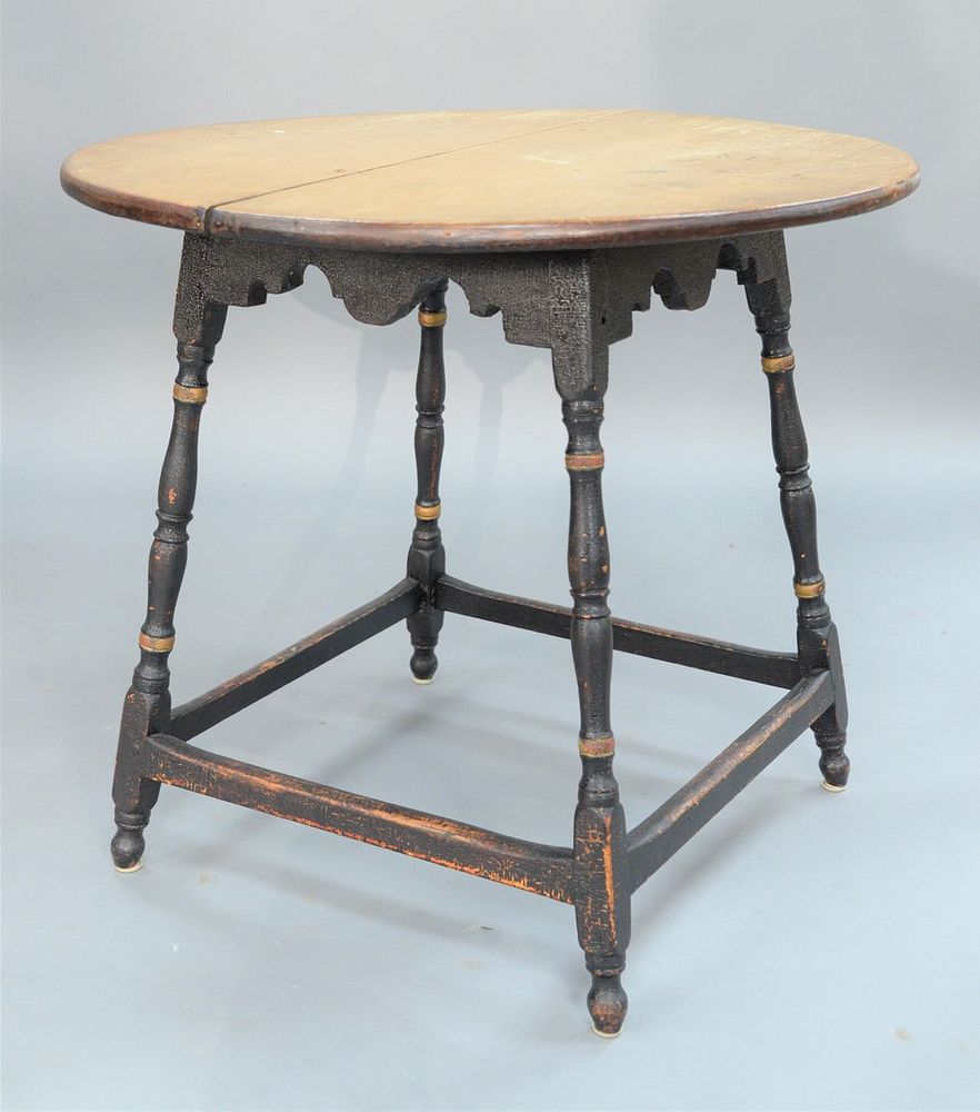 Appraisal: Tavern Table having round maple top on over scalloped apron