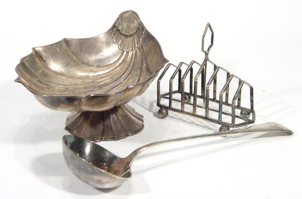 Appraisal: Silver plated shell shaped centrepiece soup ladle and a six