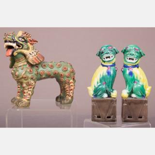 Appraisal: A Pair of Chinese Famille Verte Kylins A Pair of