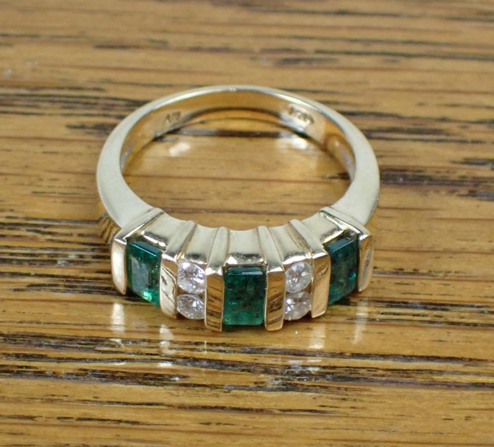 Appraisal: EMERALD DIAMOND AND FOURTEEN KARAT GOLD RING channel set with