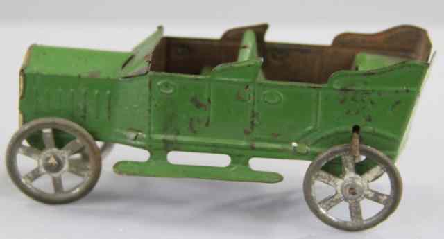 Appraisal: FRENCH OPEN TOURER PENNY TOY Painted in green overall spoke