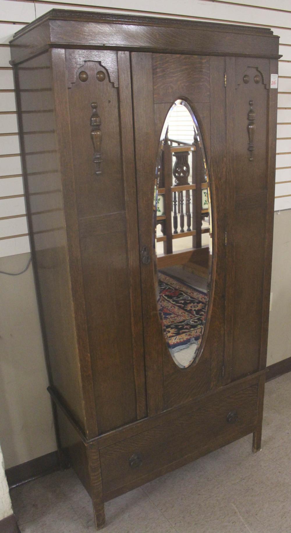 Appraisal: AN OAK SINGLE-DOOR WARDROBE English early th century H x