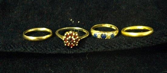 Appraisal: A sapphire and diamond ring in an ct gold scroll