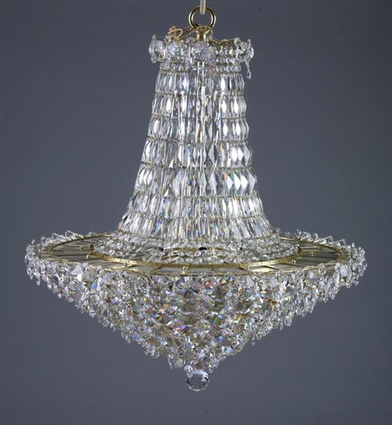 Appraisal: CONTEMPORARY CRYSTAL CHANDELIER early st century Graduated chain-hung cone-form top