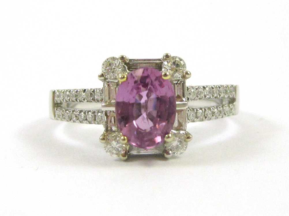 Appraisal: PURPLE SAPPHIRE DIAMOND AND FOURTEEN KARAT GOLD RING with AIGS