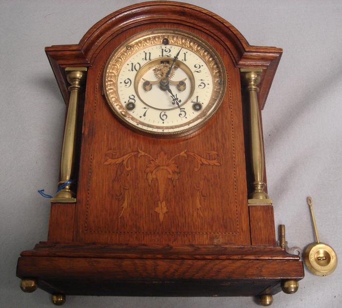 Appraisal: Ansonia inlaid oak mantle clock brass columns porcelain dial with