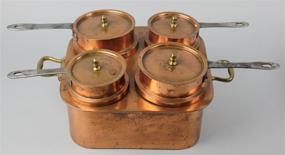 Appraisal: SET OF FOUR BRASS AND COPPER MOUNTED SAUCEPANS IN COPPER