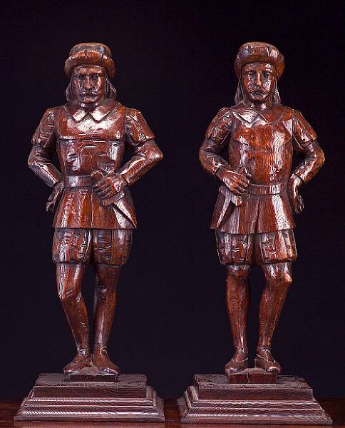 Appraisal: A pair of Continental carved oak figures second half th