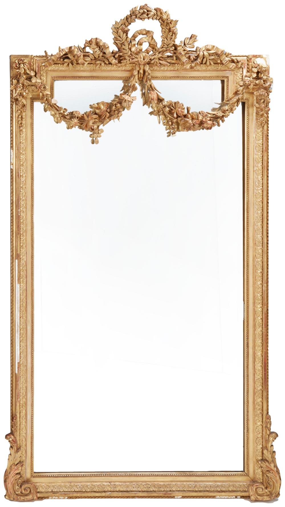 Appraisal: A French carved giltwood wall mirror Late th Early th