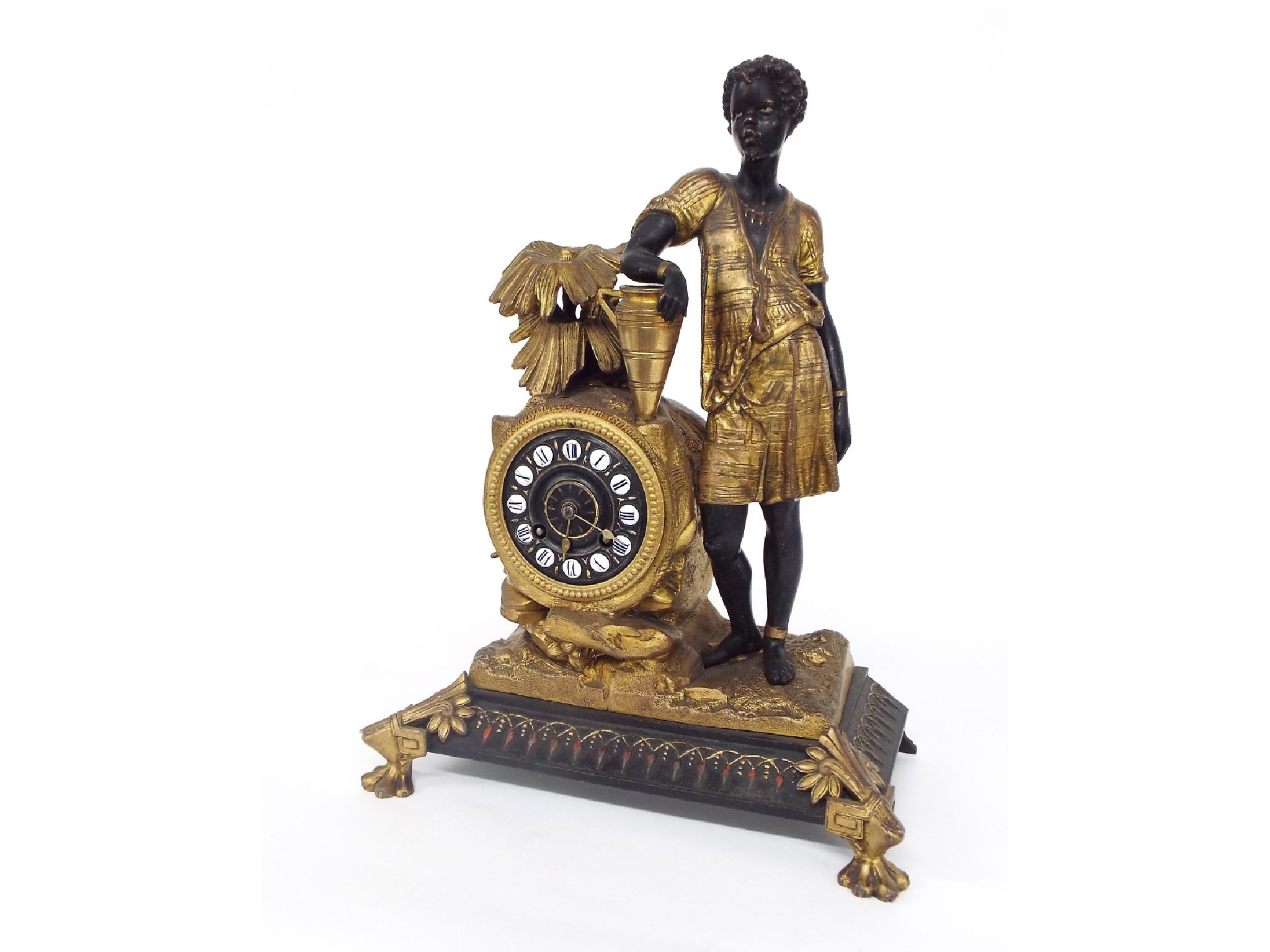 Appraisal: French ormolu and bronze blackamoor figural two train mantel clock