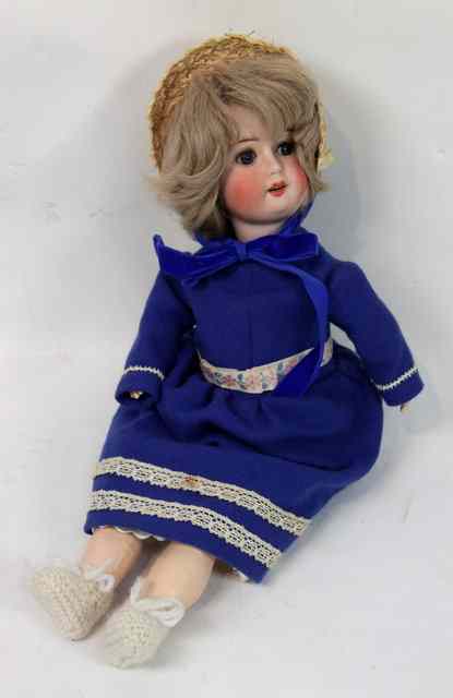 Appraisal: A W G German bisque headed doll made in Germany