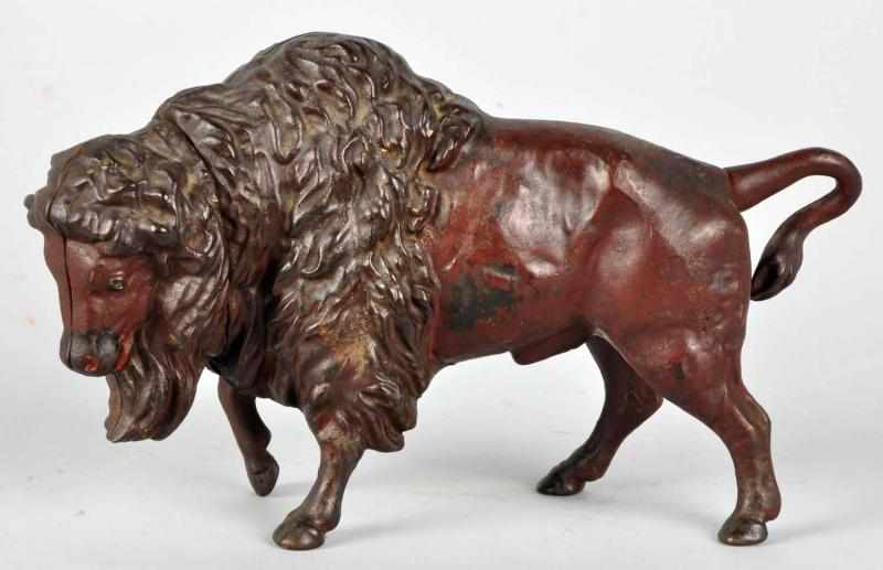 Appraisal: Cast Iron Buffalo Mechanical Bank Description Working All original Buffalo