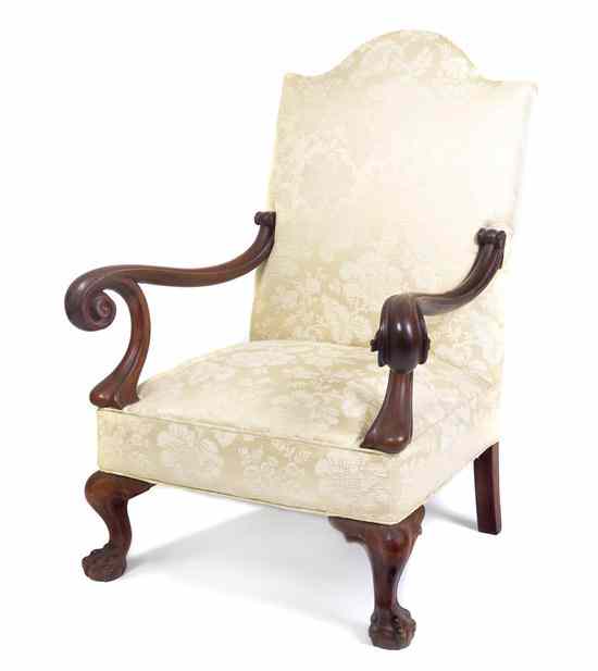 Appraisal: An American Empire Mahogany Armchair having an arched upholstered back