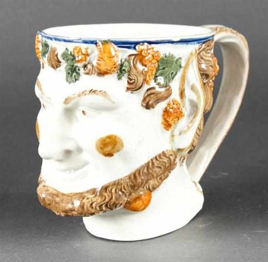 Appraisal: Staffordshire pearlware Bacchus mug first quarter- th century modeled as