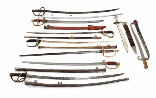 Appraisal: Collection of nine edged weapons swords and blades most with