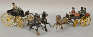 Appraisal: Two cast iron horse drawn wagons including one having a