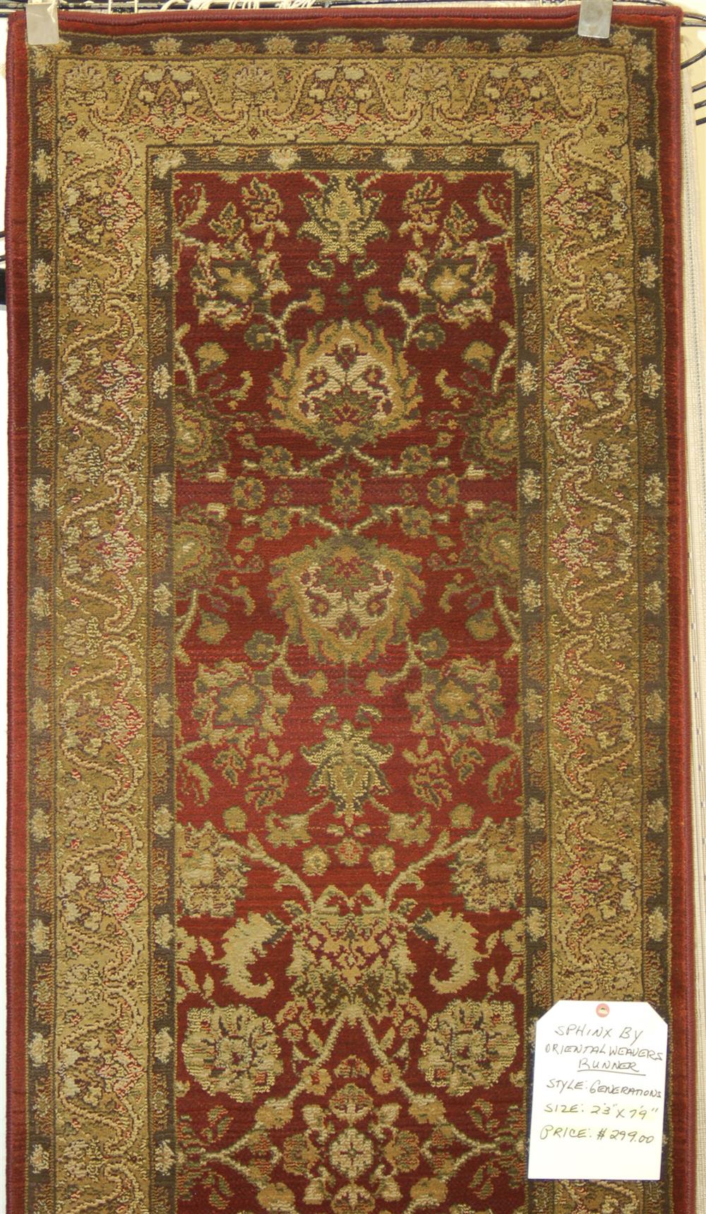 Appraisal: ORIENTAL MACHINE MADE RUNNER having a rust field ivory border