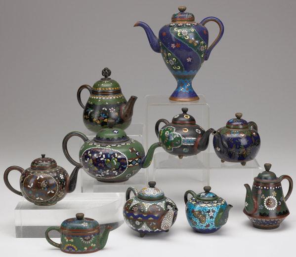 Appraisal: CLOISONNE MINIATURE TEAPOTS Grouping of ten in shades of blue