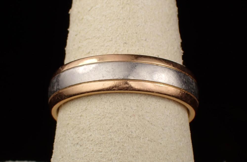 Appraisal: MAN'S COGE SIGNED PLATINUM AND EIGHTEEN KARAT GOLD WEDDING BAND