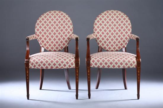 Appraisal: PAIR GEORGIAN STYLE INLAID MAHOGANY ARM CHAIRS th century Oval