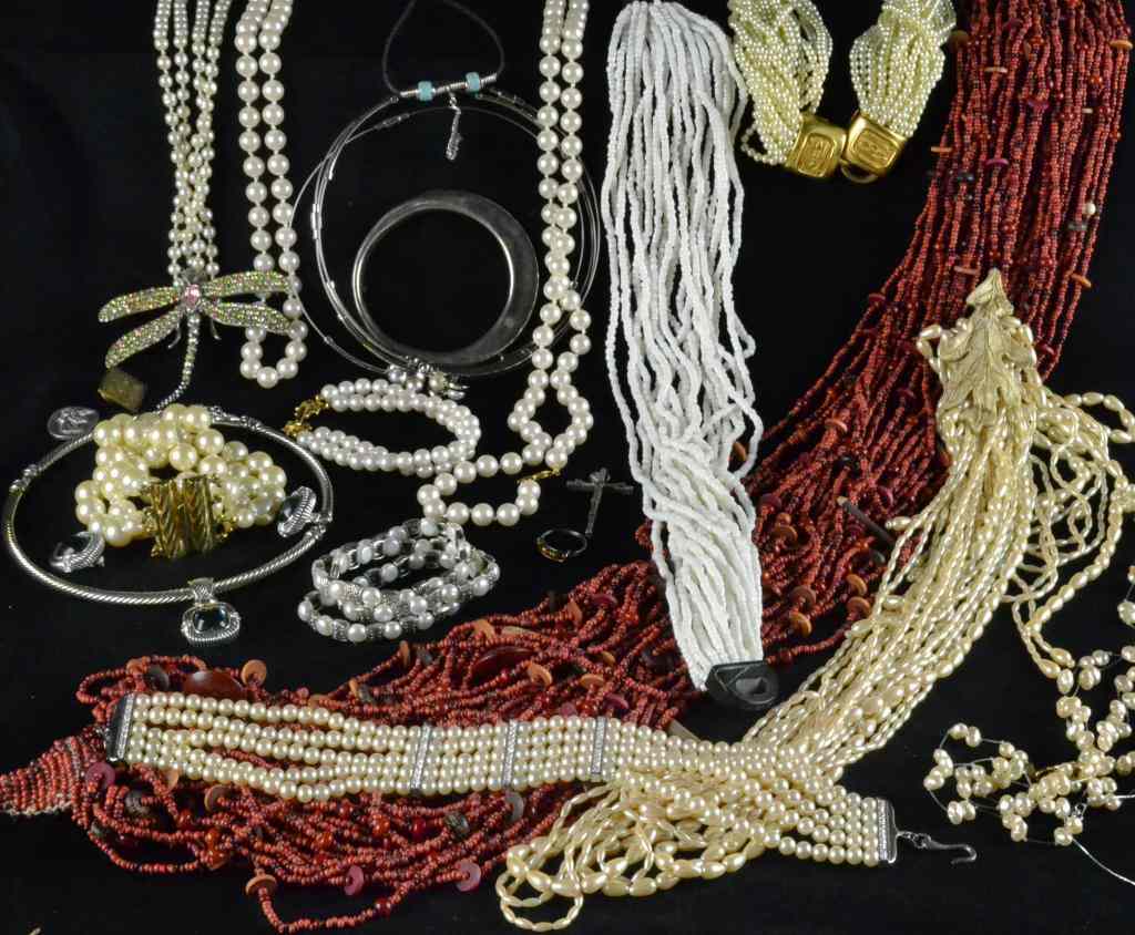 Appraisal: Costume Jewelry in Red Velvet BoxTo include a variety of