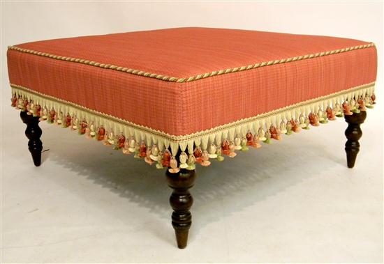 Appraisal: Ottoman soft red with texture upholstery fringed skirt braided edge