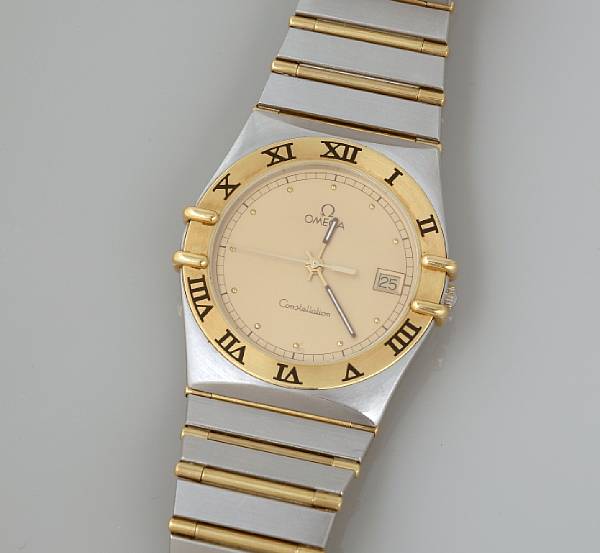 Appraisal: A stainless steel and k gold calendar bracelet wristwatch Omega