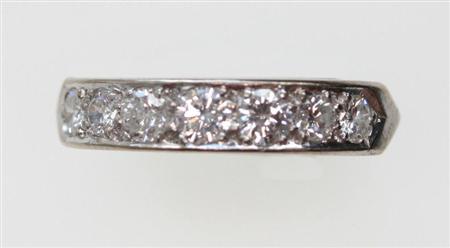 Appraisal: A diamond half hoop eternity ring set in ct white